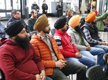 An audience looks on at a ceremony marking Sikh Heritage Month at Tom Davies Square in Sudbury, Ont. on Monday April 3, 2023. The Nishan Sahib Sikh flag was raised during the ceremony. John Lappa/Sudbury Star/Postmedia Network