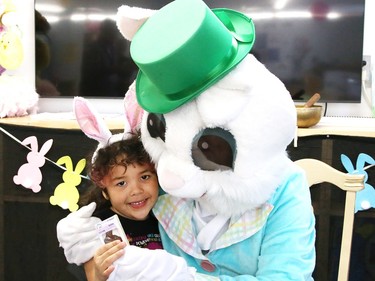 Penny Ritch, 5, of Churchill Public School, hugs the Easter Bunny at the school in Sudbury, Ont. on Thursday April 6, 2023. The Easter Bunny and Ward 11 Councillor Bill Leduc visited a number of schools and senior residences, including Churchill, Pius XII Catholic Elementary School, Ecole St-Pierre, Westmount Retirement Residence, Extendicare Falconbridge and Finlandia Village. About 750 Easter treats were handed out to students and seniors on Thursday. The visits were made possible thanks to the Minnow Lake Community Action Network and Leduc. The Easter Bunny will visit Birkdale Village and Carmichael townhouses Saturday. John Lappa/Sudbury Star/Postmedia Network