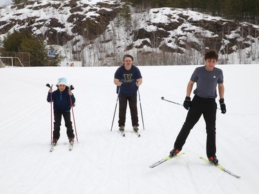 Steffon Luoma and his kids, Olivia, 8, and Julian, 13, cross-country ski at the Laurentian Nordic ski trails at Laurentian University in Sudbury, Ont. on Monday April 10, 2023. John Lappa/Sudbury Star/Postmedia Network