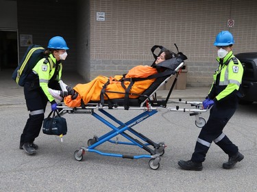 Participants take part in a shooting scenario at College Boreal in Sudbury, Ont. on Wednesday April 19, 2023. Members of the Greater Sudbury Police, paramedics and students from the college participated in the simulation. John Lappa/Sudbury Star/Postmedia Network