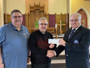 Grand Knight Jean Marc Leclerc and Deputy Grand Knight Roger Courville of the Knights of Columbus, Council 12859 of The St. Anthony of Padua Parish, present Father John Lemire, Pastor of St. Anthony of Padua Parish, a cheque in the amount of $3,000.

Supplied