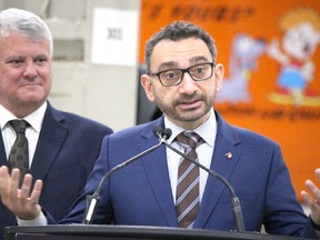 Federal Transport Minister Omar Alghabra and MP Terry Sheehan (Liberal - Sault Ste. Marie) speak at PUC Services in Sault Ste. Marie on Wednesday. They were discussing mining within the Ring of Fire and the need for minerals to support the electric vehicle industry.

BRIAN KELLY/Postmedia Network