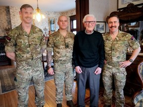 Tom Boneham of Tillsonburg was visited by three soldiers from 30 Commando Information Exploitation Group, Royal Marines, who travelled to Tillsonburg to help celebrate Boneham's 100th birthday at Seven Gables on March 21. Boneham is the last of the original 30 Commandos. From left are Marine Liam Walker, Warrant Officer 2nd Class Mathew 'Dewie' Dewsnap, Boneham, and Major Ric Cole. CHRIS ABBOTT