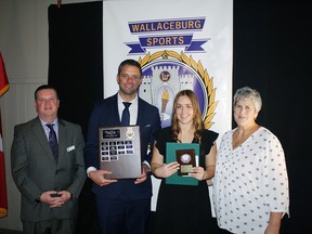 Catie Dawson, centre-right, was named the athlete of the year by the Wallaceburg Sports Hall of Fame.  Shown with Dawson are Ed Freeburn, hall of fame committee member;  head speaker Andy Fantuz;  and Marcia Simpson, hall of fame committee member.  (Handout/Postmedia Network)