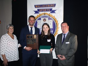 Kate Martin, centre-right, received the annual scholarship from the Wallaceburg Sports Hall of Fame.  She is shown at the April 2023 ceremony with Marcia Simpson, hall of fame committee member;  head speaker Andy Fantuz;  and Ed Freeburn, hall of fame committee member.  (Handout/Postmedia Network)