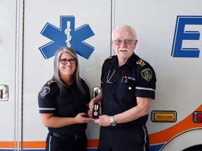 Crystal Szybunka, left, and Bill McAree each received the Platinum Jubilee Medal recently. Szybunka and McAree are advanced care paramedic supervisors for Associated Ambulance in Whitecourt.