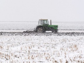 Farm in winter tractor snowy field snow getty images stock photo