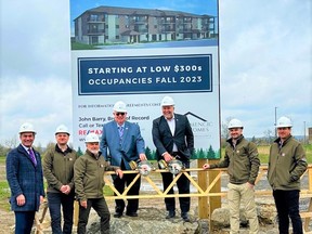 Mayor Jim Harrison and Todd Smith, Bay of Quinte MPP, (centre) were all smiles alongside Klemencic Homes Inc. builders at the sod-turning launch Monday of Hillside Flats, a 92-unit apartment condominium project in the Hillside Meadows subdivision in the west end of Trenton. POSTMEDIA