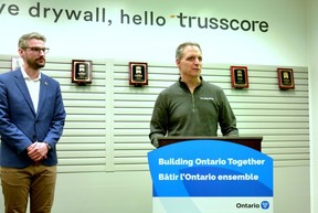 Perth-Wellington MPP Matthew Rae (left) joined Trusscore CEO Dave Caputo at the company's factory in Palmerston Wednesday morning to announce $1.5 million in provincial funding to support the company's planned, $10-million factory expansion and upgrade that will bring 68 new jobs to the region.  (Galen Simmons/The Beacon Herald)