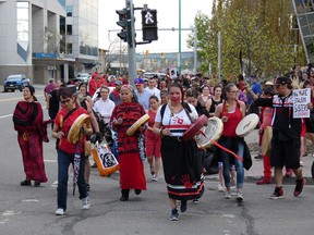 Katherina Morris, a member of the Tl’azt’en First Nation, organized the event and led the procession from the RCMP building, to the courthouse, and finally to Lheidli T'enneh Memorial Park.