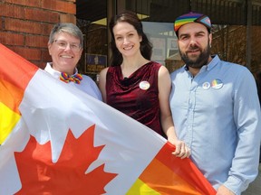 Marianne Willson, left, president of the Chatham-Kent Gay Pride Association, Michelle Wright, treasurer, and Nathan Dawthorne, vice-president, are shown during the official opening of Bill's Place, which serves as a hub for the organization while offering programs and brackets.  (Trevor Terfloth/The Daily News)