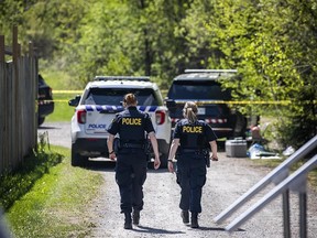 Members of the Ontario Provincial Police and Ottawa police were on the scene of the shooting of OPP Sgt. Eric Mueller on Laval Street in Bourget Saturday, May 13, 2023.