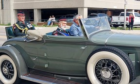 Prince Michael of Kent leaves Christ Church in a vintage automobile following the laying up of the old colors of the Essex and Kent Scottish Regiment flag during a service on Sunday. PHOTO Ellwood Shreve/Chatham Daily News