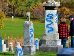 A Stirling-Rawdon woman identified legally as “Wild” was arrested Jan. 13 and charged with three counts of mischief over $5,000 in connection with November 2021 acts of vandalism in two local cemeteries. DEREK BALDWIN FILE