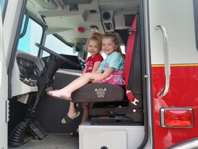 The Davidson sisters of Brantford, Sloane and Mila ,clambered over the fire and rescue equipment on display May 13 at the Southampton fire station as part of the Rotary Club of Southampton’s family fun day.