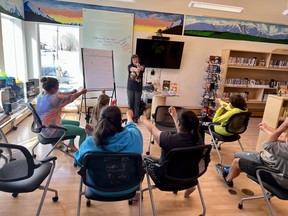 Parkland County author, Joan Marie Galat, has released her 25th book, "Too Much Trash: How Litter is Hurting Animals." She is pictured promoting literacy to a group of youth in the Northwest Territories during the 2023 Canadian Children's Book Week tour earlier this month. Photo supplied.