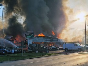 An auto repair shop, Johnny B's Automotive, in Meaford burns on Thursday May 25, 2023. The blaze triggered a state of emergency and an advisory against drinking tap water for five days and counting. (Photo: Jessy Beasley)
