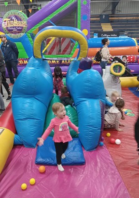 Emma Hallman, 1, of Caledon East could barely contain her glee while playing in the junior bouncy area of The Plex during the Hello Summer Expo hosted May 2-21 by the Rotary Club of Port Elgin.