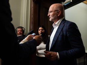 David Lametti, Minister of Justice and Attorney General of Canada, speaks to reporters after a caucus meeting on Parliament Hill in Ottawa, on Wednesday, May 10, 2023.