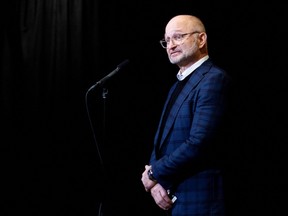 Minister of Justice and Attorney General of Canada David Lametti speaks to the media after arriving for a federal cabinet retreat over the next three days in Hamilton, Ont., Jan. 23, 2023.