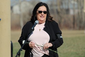 Pastor Beverly Fawcett says the openng prayer for ceremonies for the National Day of Mourning at J. Howard Pew Park on April 28, 2023. Vincent McDermott/Fort McMurray Today/Postmedia Network