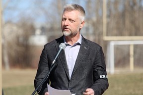 Keith Plowman, president of the Fort McMurray Construction Association, speaks at ceremonies for the National Day of Mourning at J. Howard Pew Park on April 28, 2023. Vincent McDermott/Fort McMurray Today/Postmedia Network