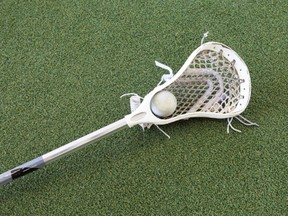 Stock photo of lacrosse stick and ball