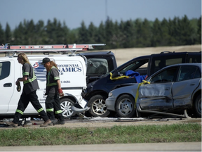 One person transported to hospital via STARS air ambulance after smoke and fog obscured Highway 21 just west of the Highway 14 interchange. At least 30 cars, trucks and semis were involved in the collision that closed the westbound lanes. PHOTO BY SHAUGHN BUTTS/Postmedia