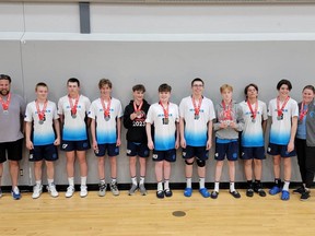 The U15 Hawks boys take a celebratory group photo with their silver medals earned at the Canadian Youth Nationals.