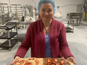 Olesya Krivobok, president of Mastro Vinci, holds a tray filled with some of the company's gluten-free products. The company has opened a new manufacturing facility on Elgin Street in Brantford. (Submitted photo)
