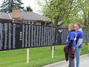 Banners listing the names of more than 2,050 people who received care at Stedman Community Hospice since it opened in 2004 line the roadway at the start of the Hike or Bike for Hospice in Brantford on Sunday, May 7. MICHELLE RUBY
