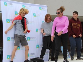 Marilyn Parisien having some fun dancing fun with student volunteers at the CMHA Champlain East Mental Health Week event. Photo on Friday, May 5, 2023, in Cornwall, Ont. Todd Hambleton/Cornwall Standard-Freeholder/Postmedia Network