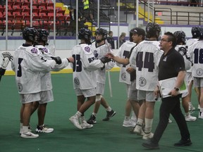 Akwesasne Thunder head coach Raweras Mitchell joins players on the floor for a post-game handshake with the Orillia Kings that concluded a very successful weekend for the OJBLL squad on its home turf. Photo on Sunday, May 14, 2023, in Akwesasne, Ont. Todd Hambleton/Cornwall Standard-Freeholder/Postmedia Network