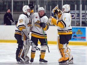 Smiths Falls Bears Kyle James, middle, and Dawson Labre, right, congratulate goaltender Will McEvoyin after Game 6 of the CCHL Jr. A Bogart Cup series against the Ottawa Jr. Senators on Tuesday May 2, 2023 in Smiths Falls, Ont. The Bears won 3-2 in OT to force Game 7 on Friday. Robert Lefebvre/Special to the Cornwall Standard-Freeholder/Postmedia Network