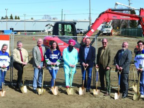 (L-R) Councillors Anita Fisher, Mike Hanly, Brian Bowles, Tanya Hugh and Gurk Dhanoa, Parkland County Mayor Allan Gamble, Drayton Valley--Devon MLA Mark Smith, Devon Mayor Jeff Craddock and Councillor Ben Gronberg break ground at the site of the Dale Fisher Arena expansion project. (Peter Williams)