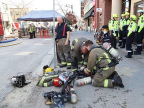 Firefighters, paramedics and police attended the scene of a fire at the Coulson building located on Durham Street and Larch Street in Sudbury, Ont. on Wednesday May 24, 2023