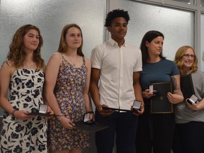 From left, Braelyn Hunter, Ava Nordin, Timothy Williams, Mylene Arseneault and Beth Typhair are recognized as life-saving heroes at a ceremony at the YMCA of Eastern Ontario location in Brockville on Friday, May 19.

(Tim Ruhnke/Special to The Recorder and Times)