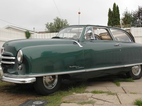 A restored 1951 Nash Rambler Airflyte Custom seen in 2009 in Edmonton. It had been stored in a barn since about 1967.