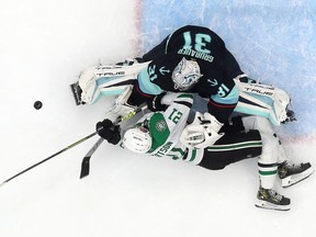 It was a meeting of former Kingston Frontenacs as goaltender Philipp Grubauer of the Seattle Kraken makes a save against Jason Robertson of the Dallas Stars during the second period of Game 3 of their second-round 2023 Stanley Cup playoffs series on May 7 in Seattle.