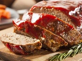 Homemade meatloaf with ketchup and spices.