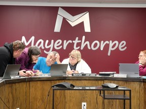 At Mayerthorpe council (l-r), Coun. Marc Claybrook, CAO Jennifer Sunderman, and councillors Pat Burns, Sandy Morton and Anna Greenwood were hard at work.