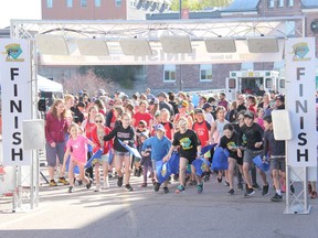 Participants in the 2K event at the 2023 Heroes Run for Healthcare head out from the start line on Pembroke Street West early Saturday morning, May 6. Anthony Dixon