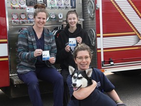 By posting an emergency decal on your front door to make first responders aware there are pets inside the home, if an emergency like a fire happens when you’re not home, this helps improve the chances your pets will be rescued or receive the care they need. You can request a free emergency decal from the Ontario SPCA at ontariospca.ca/ep. In the photo from left, Kate Graham (Ontario SPCA animal care co-ordinator), Wynter Bertrand, a co-op education student from Bishop Smith Catholic High School, and April Sereda-Ashcroft (registered veterinary technician) holding Raven. Anthony Dixon