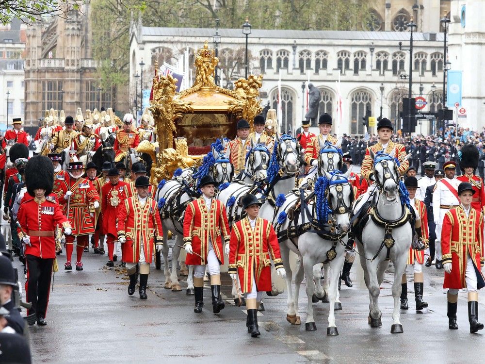  britain’s king charles and queen camilla travel in a carriage on the day of their coronation ceremony, in london, britain, may 6, 2023. gary stone/pool via reuters