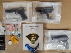 Perth County OPP seized firearms, drugs and other property from a home in Listowel while executing a search warrant May 3. (Submitted image)