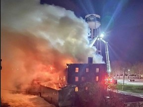 Fire crews respond to a massive blaze at the former water treatment plant in Smiths Falls on Monday, May 8 at around 3 a.m. Photo credit: Steve McWade