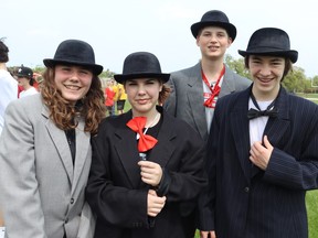 Northern Collegiate students, Anna Eagleson, left, Olivia Taylor, Jaxon Elgie and Jackson Gallaway wait for their turn to complete during Friday's Vikes on Trikes fundraiser at the Sarnia high school Friday.  Paul Morden/The Observer