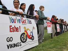 Northern Collegiate students watch Friday's Vikes on Trikes fundraiser at the school track. It was a fundraiser for the family of a 10-year-old local girl who is fighting leukemia. Paul Morden/The Observer