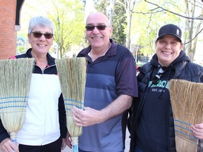 Denise Thibeault-Sanders, Dave Menzies and Laurissa Ellsworth with the Town of Petrolia were helping organize a town-wide cleanup day Saturday.  (Tyler Kula/ The Observer)