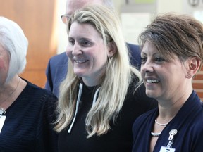 Dr. Hayley Wickenheiser visits with people at Bluewater Health in Sarnia Thursday, including Bluewater Health president and CEO Paula Reaume-Zimmer, right.  Wickenheiser was scheduled to speak at a Bluewater Health Foundation fundraising gala later that day.  (Tyler Kula/ The Observer)
